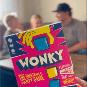Wonky unstable party game box by The OP Games